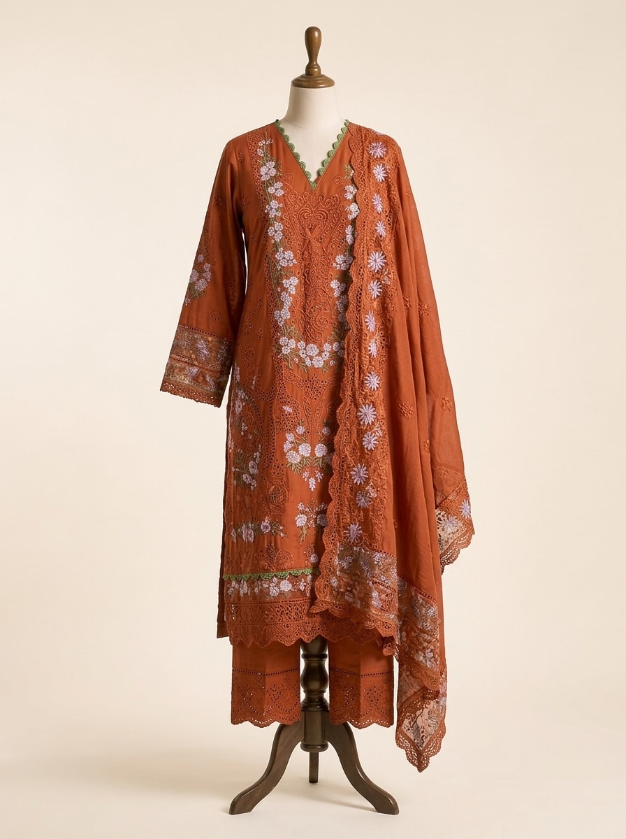 Rust Terracotta Schiffli Cutwork Kurta Set by Sahba